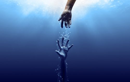 hand drown in the water looking for help